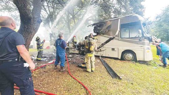 FIRE DESTROYS MOTOR HOME