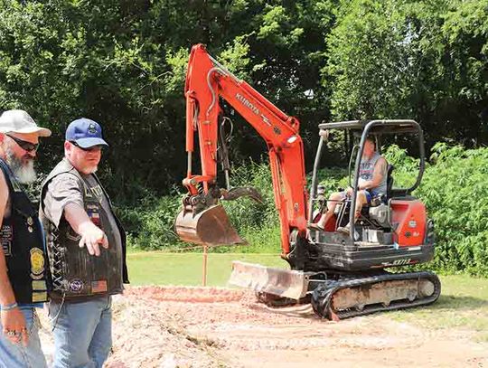 Motorcycle groups build playground for children’s home