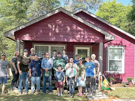 Rotary provides landscaping  grant for 20th Habitat house