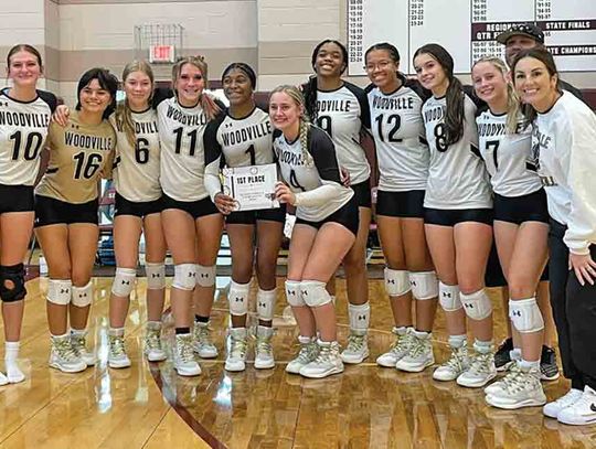 The Lady Eagles celebrate their victory in the Silsbee Tournament on Saturday.  JASON DRAKE | TCB