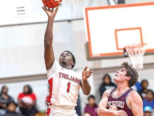 Trojans open new year with win