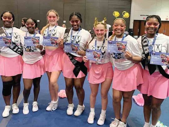 Woodville cheerleaders attend camp