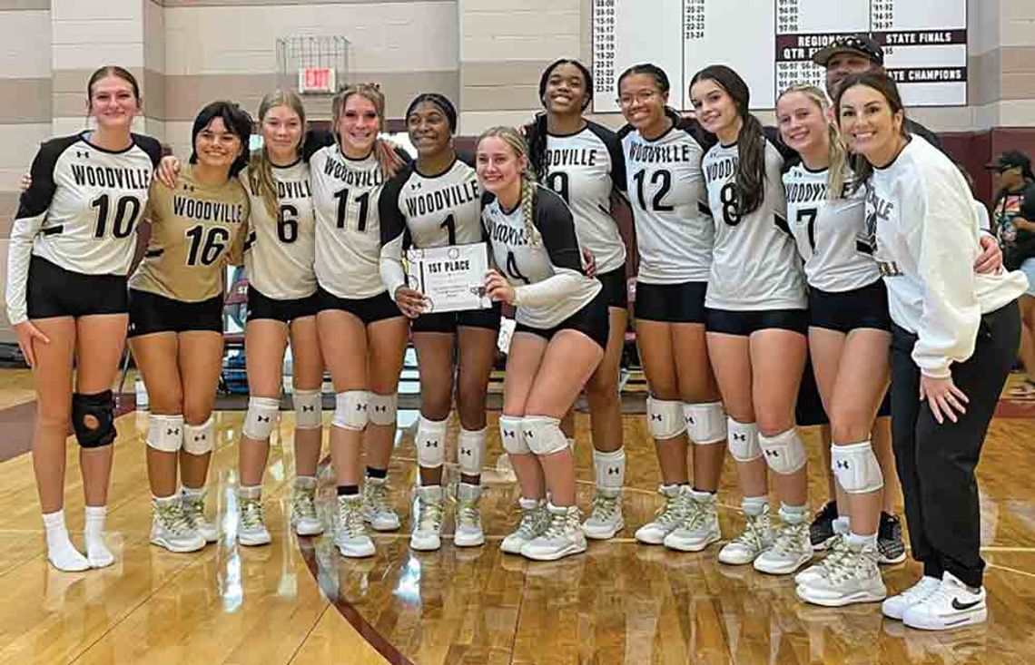 The Lady Eagles celebrate their victory in the Silsbee Tournament on Saturday.  JASON DRAKE | TCB