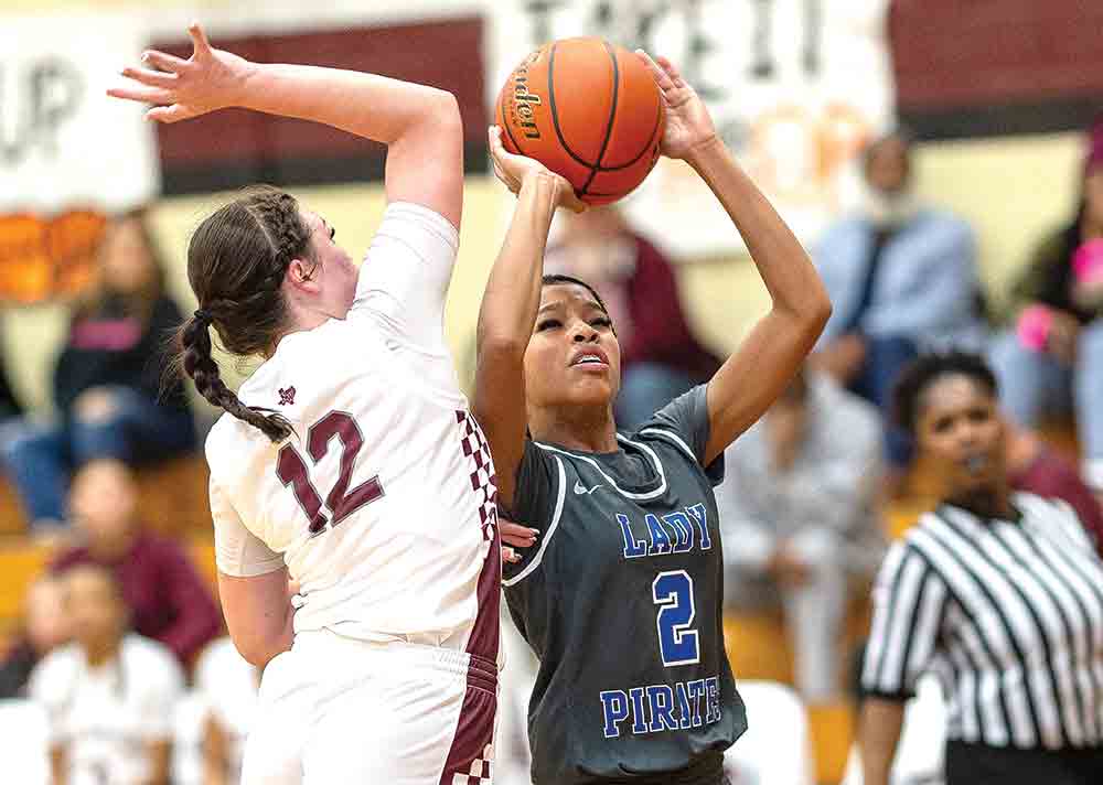 Kiona King steps just inside the paint for a 2-point jumper against the Lady Bulldogs. Photo by Charles Ballard