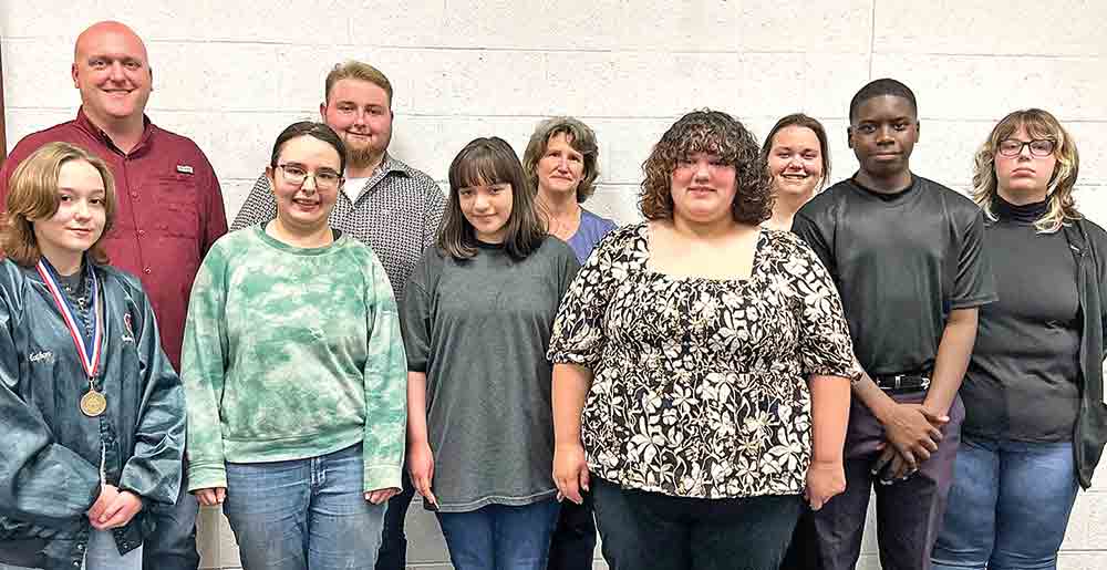 The Trinity School Board recognized UIL winners (from left) Alyssa Loesch, Lilliana Gurene, Bianca Perez, Candida Guzman, Jamarian Corley and Jamie Sency, and coaches (from left) Stephan Green, Colton Campbell, Margaret Rodriguez and Trinity Coe. UIL winners include Bianca Perez, 1st Current Issues; Candida Guzman, 3rd Current Issues; Allie Ancira, 5th (Team) Current Issues; Ja’Marian Corley, 9th (Team) Current Issues; Natalyn Jordan, 1st Computer Applications; Brooke Arnold, 2nd Computer Applications; Garrett Craig, 3rd Computer Applications; Lilyana Geurin, 3rd Copy Editing, 2nd Editorial Writing; Karrisa Musachia, 3rd Feature Writing, 3rd Ready Writing; Alyssa Loesch, 1st News Writing; Ja’Ciyah Debose, 2nd New Writing; Cade Mauldin, 2nd Science; and Jamie Sency, 2nd Accounting.COURTESY PHOTO