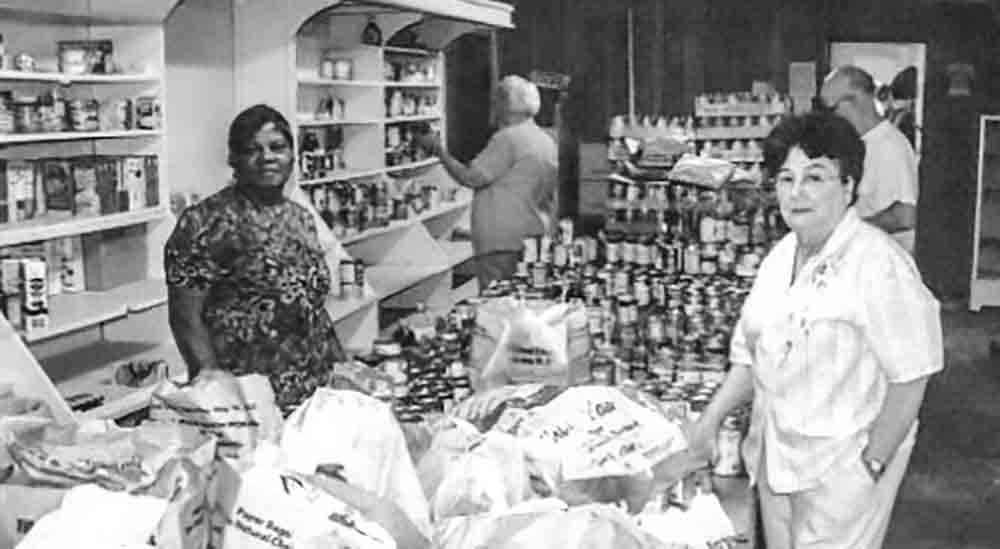 LADIES IN ACTION IS OPEN AGAIN- More than 30 years ago, Clara White established a food distribution center in Groveton. To purchase the food, she opened Ladies in Action Thrift Store. The store also helped people in need with clothing and household items. On Tuesday, the store reopened, and food will be given out on the third Thursday of each month starting on July 20. COURTESY PHOTO