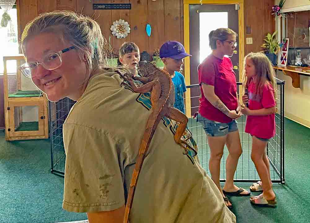 Castillo Family Farm employee Rylee is shown with her reptile friend.  MOLLIE LASALLE | TCB