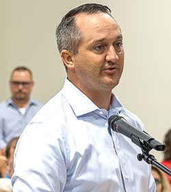 State Rep. Ernest Bailes swings his support for the Texas Declaration of Local Disaster at the Commissioners Court on June 14. Photo by Charles Ballard