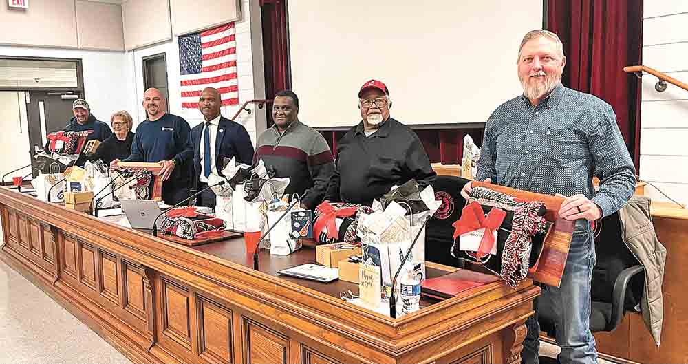 The COCISD Board of Trustees showed off the fun gifts they received at the school board meeting on Monday, Jan. 23, for School Board Recognition Month. Pictured from left: Trustee William B. Baker, Board Secretary Barbara Moore, President Paul Buchanan, Superintendent Dr. Bryan Taulton, Trustee Alec McGowen, Trustee Berlin Bradford, and Trustee Tony Sewell. Courtesy Photo by J.W. Kirkham