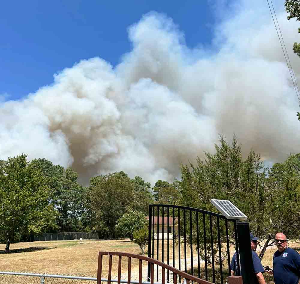 Smoke billows over the Ghost Branch Road fire near Glendale. COURTESY PHOTO