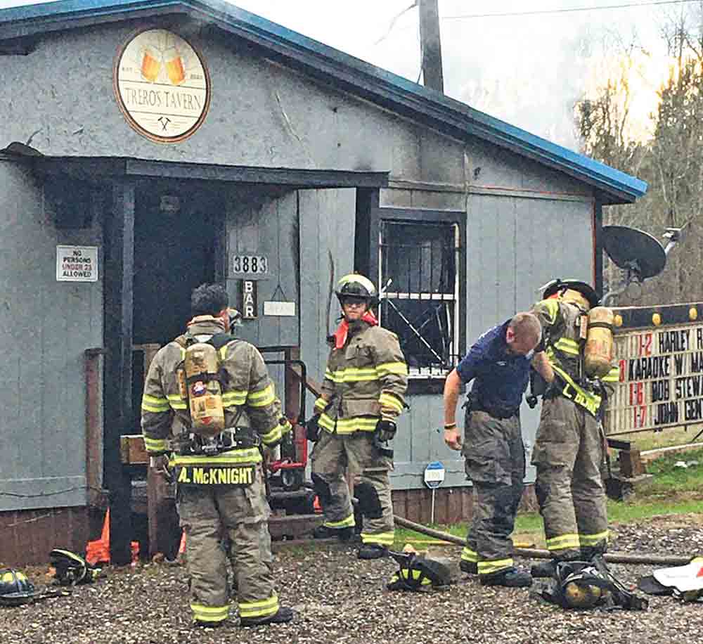 Trinity Fire Department and 356 Fire Department volunteers help battle a fire that broke out in Trero’s Tavern on Sunday.