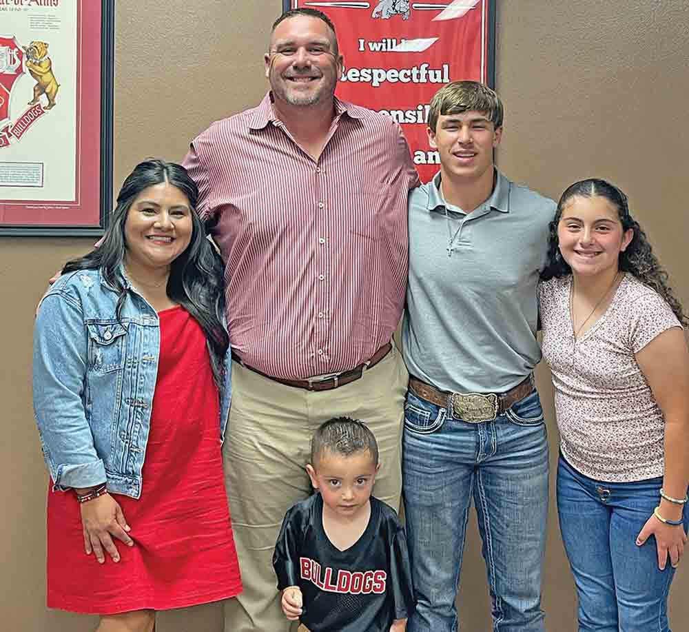 Coach George Taylor and family. MOLLIE LASALLE | TCB