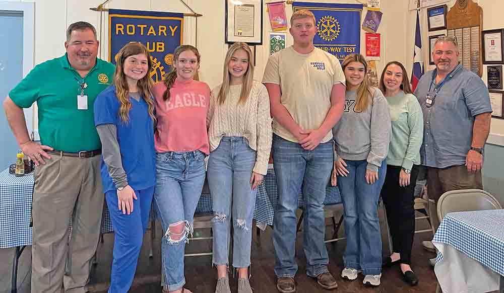 Pictured left-to-right: Woodville HS Principal Rusty Minyard; Madison Wainwright; Sydnie Odom; Savannah Ludewig; Keegan Welch; Emma Odom; Interact Sponsor Janay Wigley and Rotary club President John Wilson.