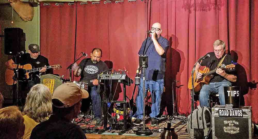 CC & the Road Dawgs will provide live music at the upcoming Earth Day event and fundraiser hosted by Polk County Recycling & Beautification on April 22. The band recently performed at Across the Tracks, a live music venue in downtown Livingston. (l-r) Louis Ploth, Lee Musquiz, Carlos Cardozo and Steve Bache. Photo by Emily Banks Wooten