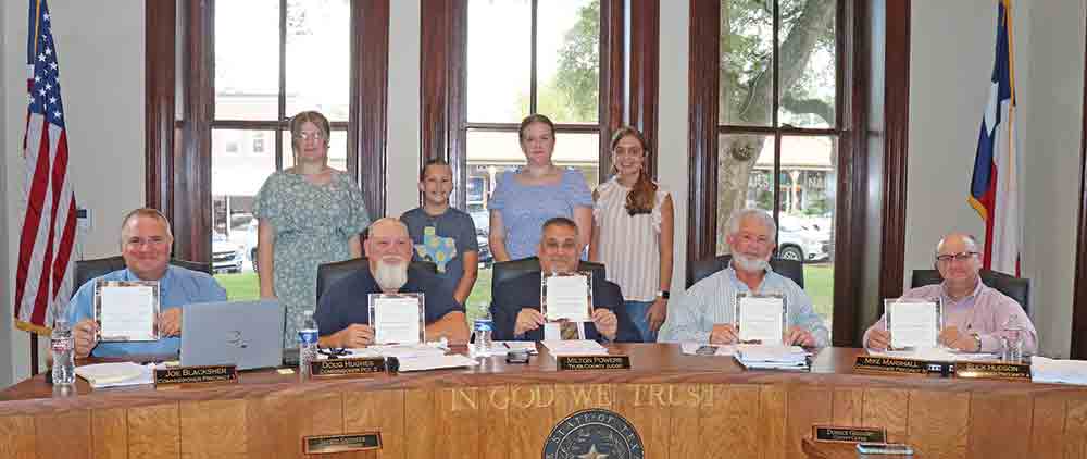 The county’s new 4-H council was introduced in Commissioners Court on Monday morning. President Adelyn Johnston; Vice President Myra Dalton; Secretary Molly Dalton; and Reporter Isabella Lanclos are shown with Commissioners Joe Blacksher; Doug Hughes; Mike Marshall; Buck Hudson and County Judge Milton Powers. Not pictured was 4-H Treasurer Emma Tally. CHRIS EDWARDS | TCB