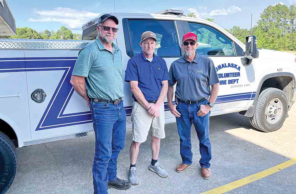 The Onalaska Volunteer Fire department receives a $1,000 donation from Georgia-Pacific, which will be used to help fuel the department’s emergency vehicles. Pictured from (l to r) are Myrton Thompson, Georgia-Pacific Camden Lumber Plant Manager; Jay Stutts, Onalaska VFD Chief; and John Cleveland, Onalaska VFD Lieutenant.