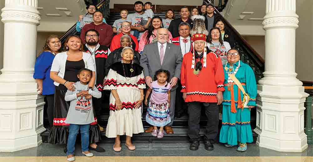 Sen. Robert Nichols (center) stands with members of the Alabama-Coushatta Tribe of Texas during Alabama-Coushatta Day at the State Capitol on Feb. 7. Courtesy photo