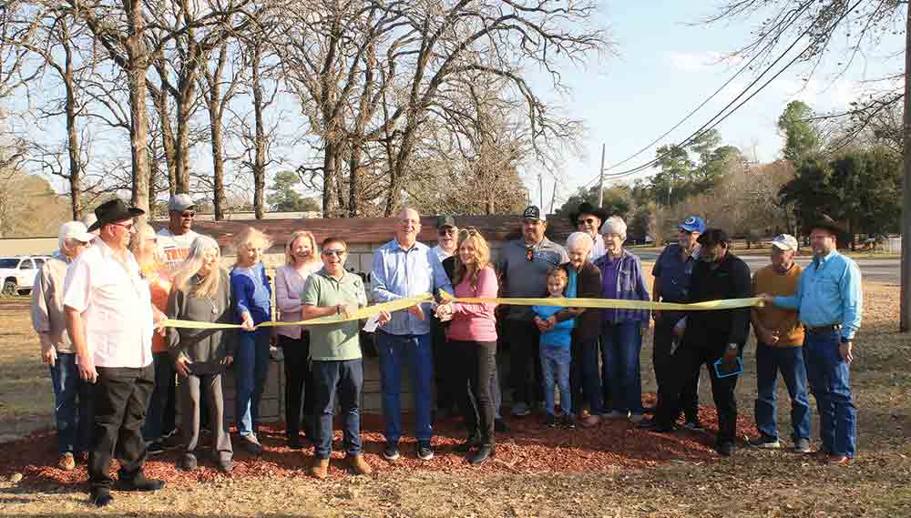 The Trinity Beautification Committee commemorates the end of a project. Photos by Tony Farkas