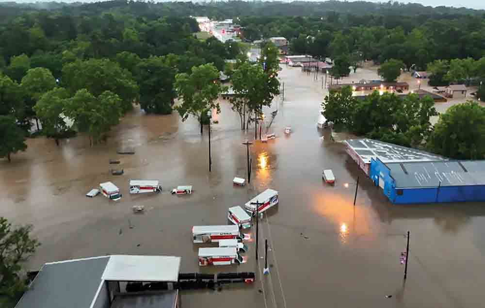 WIDESPREAD FLOODING IN REGION - This aerial shot from downtown Livingston last week shows how hard the area was affected by the severe weather last week. Thousands of residents fled their homes, throughout East/Southeast Texas, as heavy rains saturated land in multiple counties. Photo by Drone Bros LLC