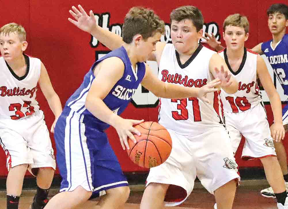 Centerville/Groveton Junior High Bulldog Bradyn Woychesin (No. 31) plays defense. 