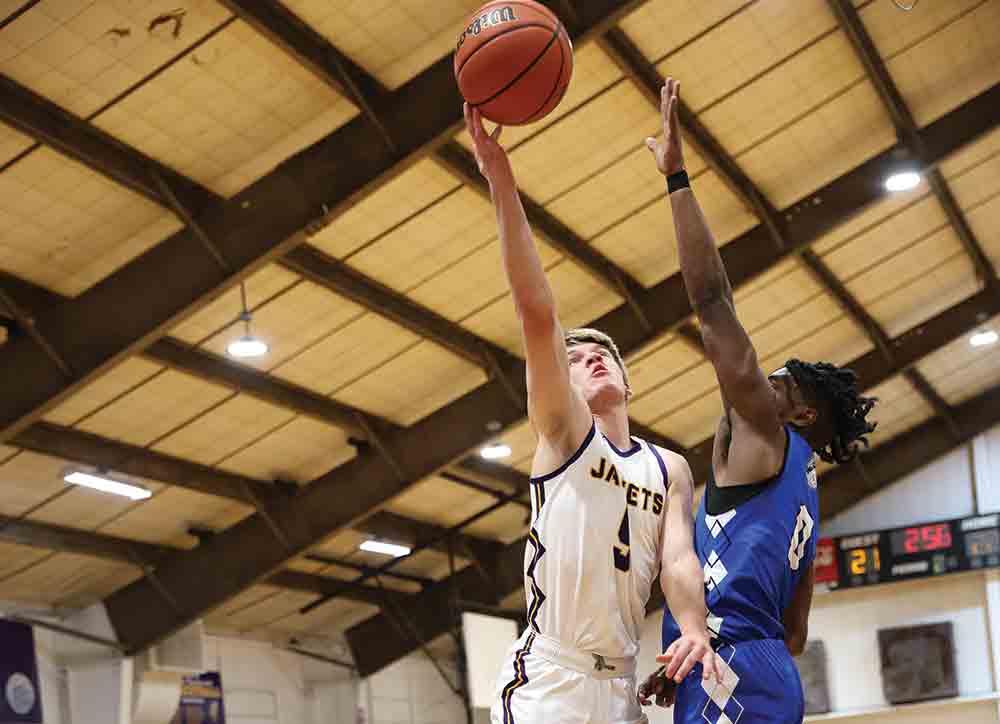 Jaxon Gay sinks a contested layup against Burkeville. BECKI BYRD | TCB