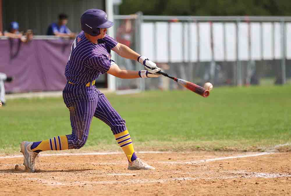 Cutter Lowe lays down a bunt in the win against Little Centerville. BECKI BYRD | TCB