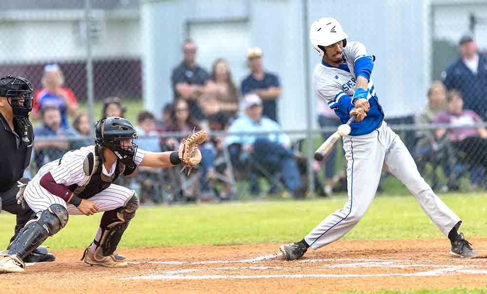 Tristen Cullum hits a nice curveball during the Tarkington game. 