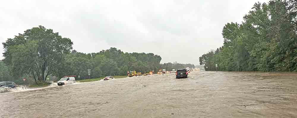 LOCAL FLOODING CONTINUES All four lanes of traffic were underwater on U.S. 59 south of Goodrich Thursday following torrential thunderstorms that impacted Polk and surrounding counties. The area has suffered catastrophic weather events, flooding, hail and tornadoes since April 26. Photo courtesy Polk County Department of Emergency Management