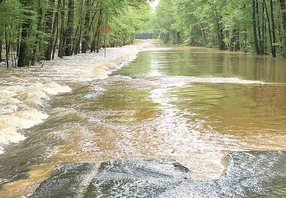 FM 945 South at the San Jacinto River has suffered damage due to flooding. This roadway will be closed until repairs are made. Motorists should choose alternate routes. FM 1127 and FM 3278 in San Jacinto County are still flooded. Stay alert and never drive through flood waters. Courtesy photos