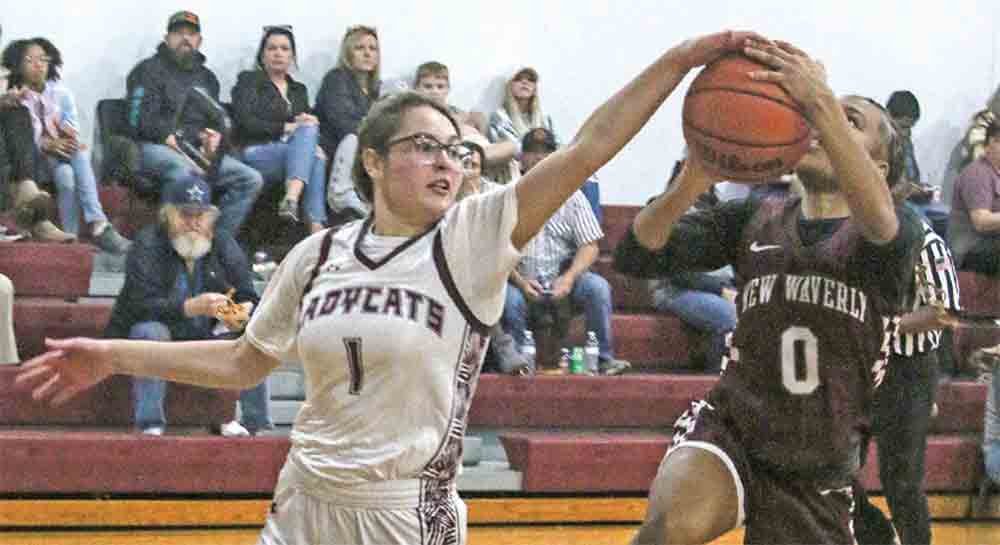 Graci Arci blocks a shot in the lane.