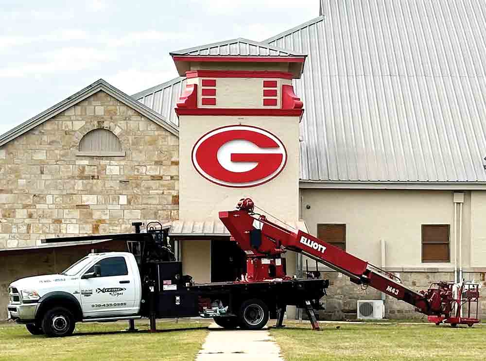 The Groveton school building got a bit of an upgrade as new signs were installed over the entrances facing Main Street. Photo by Martha Mericle