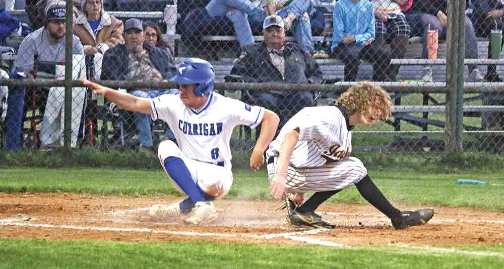 Maddodx Murphy is safe at home after a throwing error. PHOTO BY BRIAN BESCH