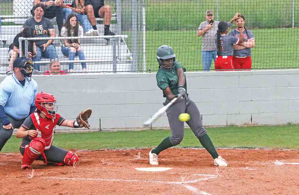 Corinne Henderson takes a swing.