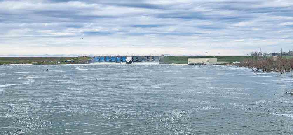 This is the view of Lake Livingston Dam at 1:19 p.m. Friday. The Trinity River Authority increased the discharge to 84,819 cfs (cubic feet per second) on Thursday but by Friday evening had decreased the discharge to 77,163 cfs.  Photo by Emily Banks Wooten