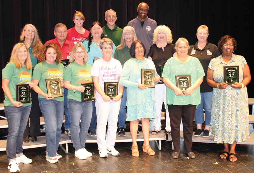 Livingston ISD honored its retirees at the district’s end-of-year awards ceremony on Friday morning. Those included: Bottom row (l-r) Nikki Butler (31 years), Mona Taylor (30 years), Karen Butler (30 years), Renae Miksch (23 years), Hermelia Duran (22 years), Yolanda Robledo (38 years) and Sherry Thomas (27 years). Middle row (l-r) Julie Barber (18 years), Glen Evans (12 years), T. Gail Evans (31 years), Roxanne Light (30 years), Kathy Lowe (34 years) and Julye Taylor (30 years). Top row (l-r) Tracie Standley (29 years), Scotty McFarlain (29 years) and Frederic Camp (24 years). Courtesy photo