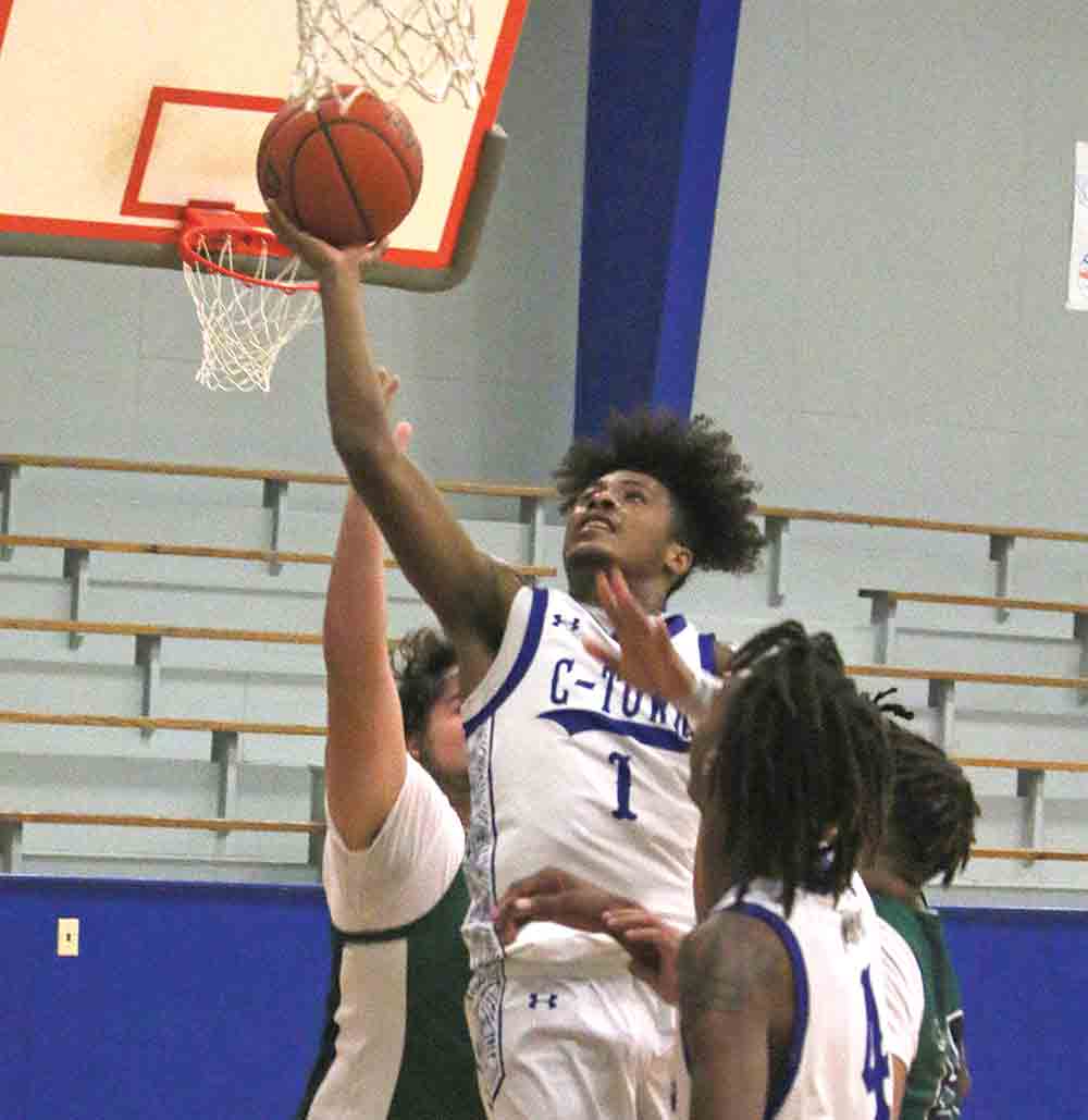 Tony Cooper drives for the layup.