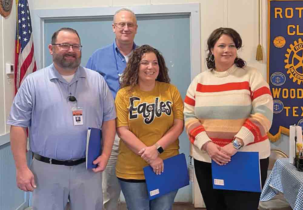 New Rotarians Keith Collins; Sandi Hanks and Lara Robinson (pictured left-to-right) were inducted into the Rotary Club of Woodville by club president Lee Mann (second from left). MOLLIE LA SALLE | TCB